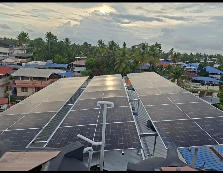 Top-down view of a completed solar panel installation on a rooftop